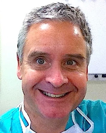 Headshot of Fran Smith wearing light blue scrubs smiling at the camera