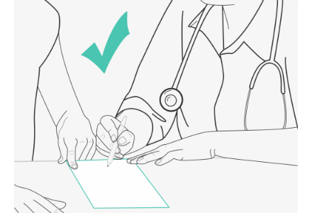 A surgeon instructing a student