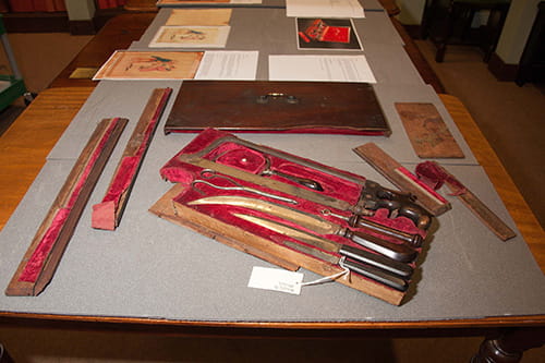 18th century British amputation set displayed on a table