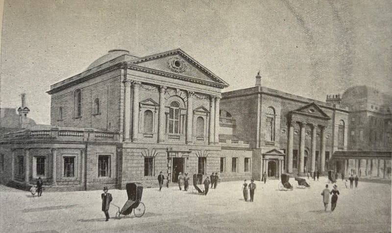 An engraving of a large Georgian building, with pedestrians in the foreground