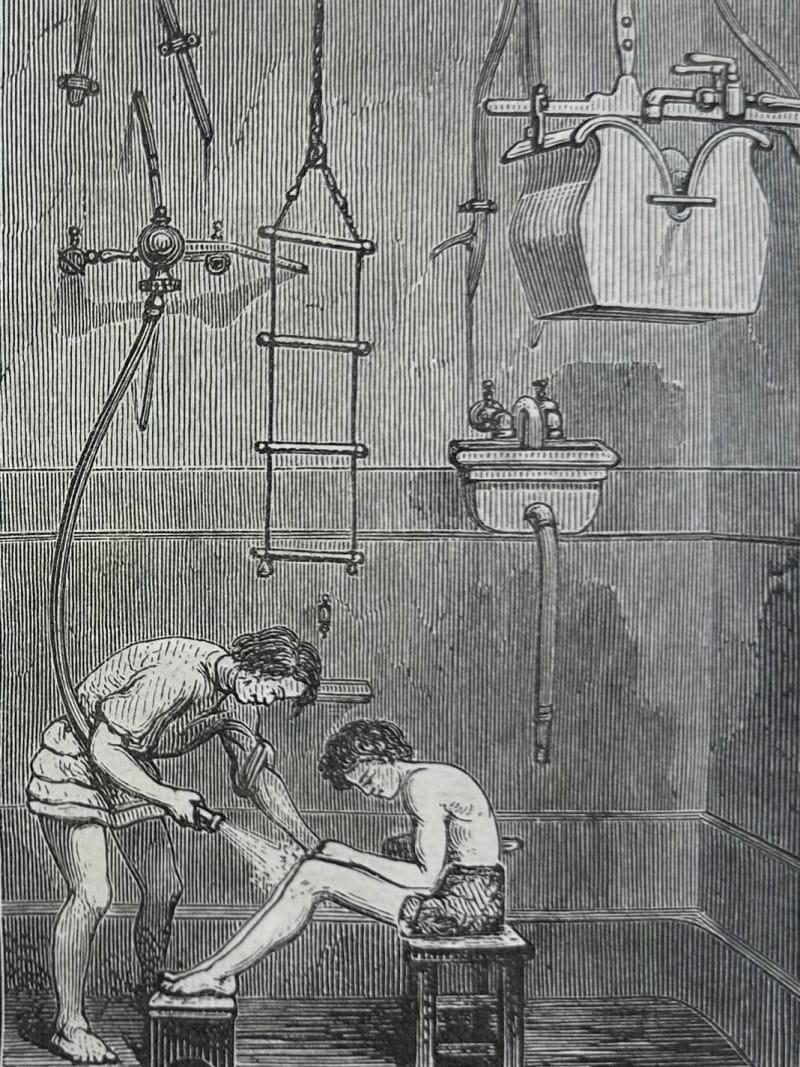 An engraving of an attendant spraying a patient with water in a room full of pipes and other equipment