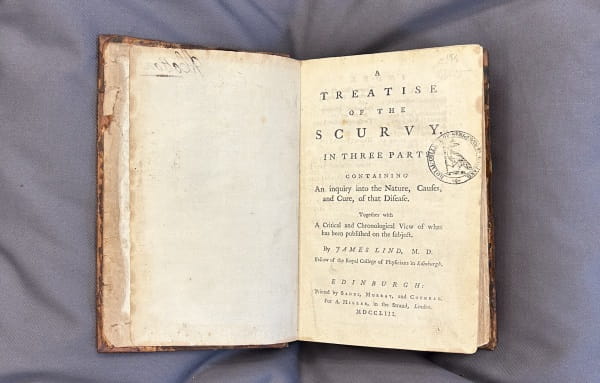 Double page spread of the title page reading 'A treatise of the scurvy in three parts, containing An inquiry into the Nature, Causes, and Cure, of that Disease, Together with A Critical and Chronological View of what has been published on the Subject...'