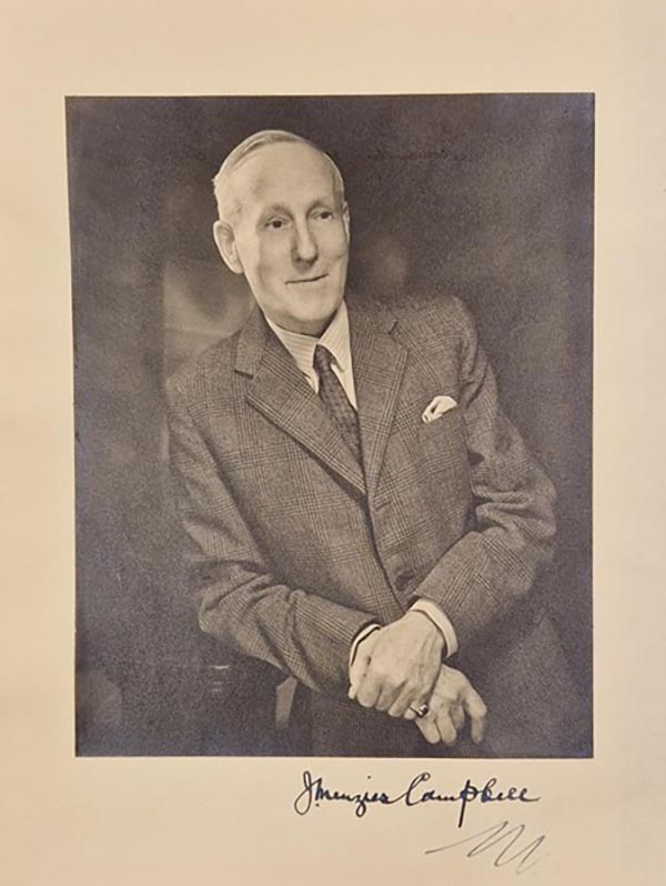 A sepia image of John Menzies Campbell in a suit, signed 'Menzies Campbell'