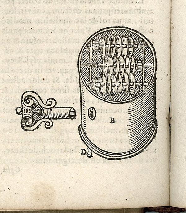 A diagram of cylinder containing multiple circular blades, and a key.