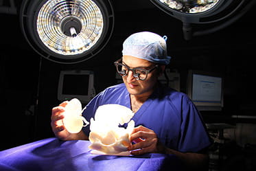 Mr Chandak with 3D Print-outs for a Transplant of an adult kidney into a two-year-old child