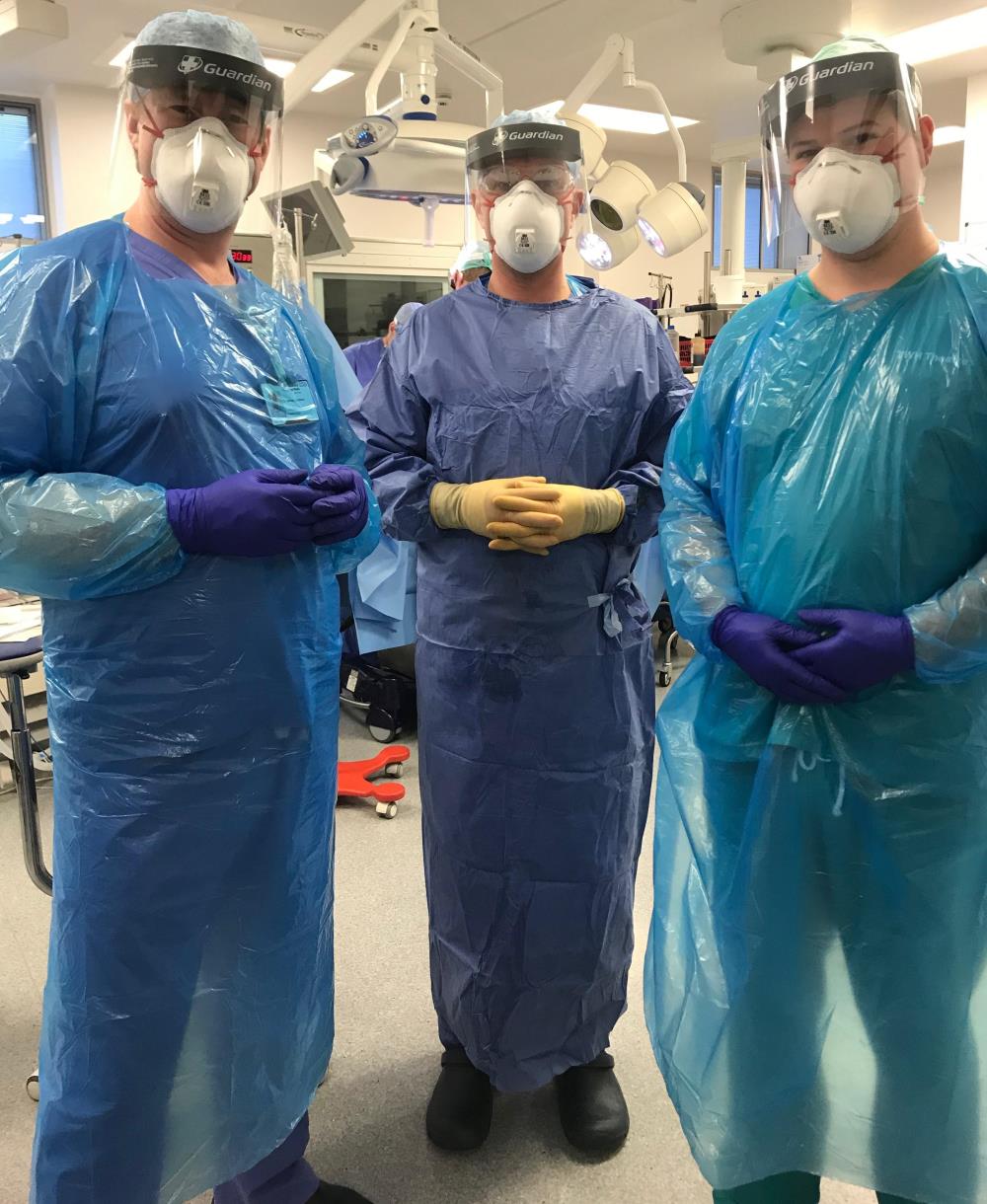 Liam and colleagues wearing PPE 